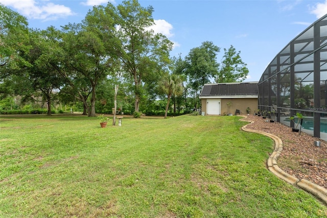 17523 Doris St, Montverde, FL 34756 - view of green lawn with a lanai and an outdoor pool