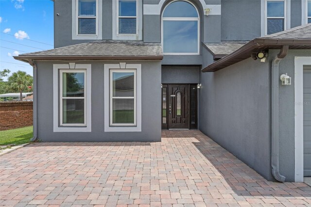 470 Regal Downs Cir, Winter Garden, FL 34787 - entrance to property with stucco siding