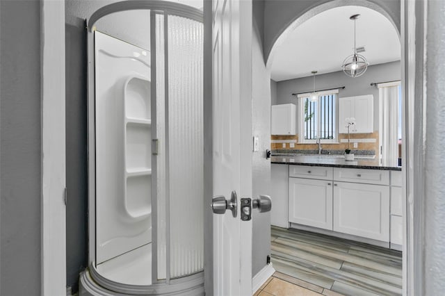 470 Regal Downs Cir, Winter Garden, FL 34787 - full bath featuring vanity, a shower stall, and backsplash
