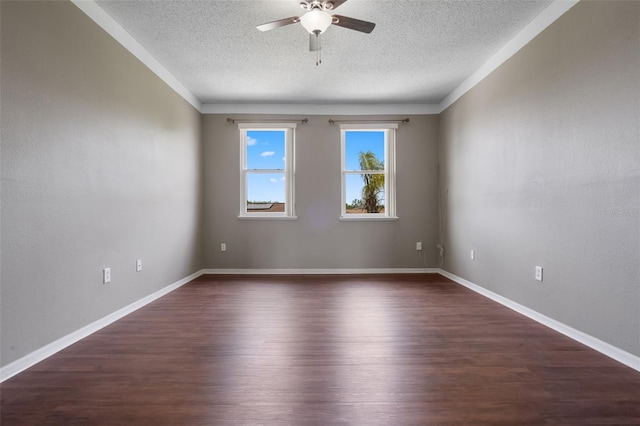 470 Regal Downs Cir, Winter Garden, FL 34787 - spare room featuring ceiling fan, a textured ceiling, dark wood-type flooring, baseboards, and crown molding