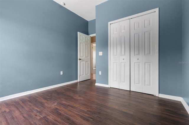 470 Regal Downs Cir, Winter Garden, FL 34787 - unfurnished bedroom with baseboards, wood finished floors, and a closet