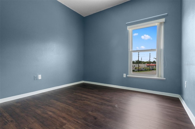 470 Regal Downs Cir, Winter Garden, FL 34787 - spare room with dark wood-type flooring and baseboards