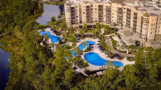 14501 Grove Resort Ave Unit 2440, Winter Garden, FL 34787 - aerial view of apartment complex / building, a pool area, and a nearby body of water