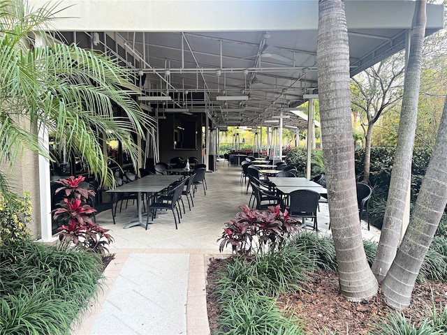 14501 Grove Resort Ave Unit 2440, Winter Garden, FL 34787 - view of property's community featuring outdoor dining area and a patio area