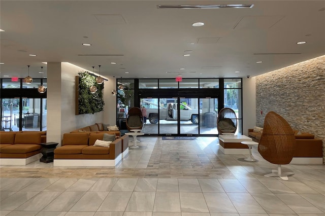 14501 Grove Resort Ave Unit 2440, Winter Garden, FL 34787 - lobby featuring floor to ceiling windows and recessed lighting
