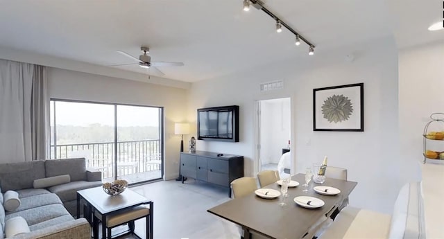 14501 Grove Resort Ave Unit 2440, Winter Garden, FL 34787 - living area featuring a ceiling fan, concrete floors, and track lighting