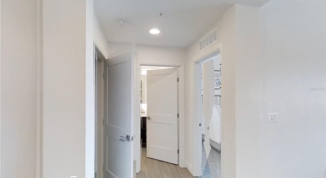 14501 Grove Resort Ave Unit 2440, Winter Garden, FL 34787 - hall with light wood finished floors