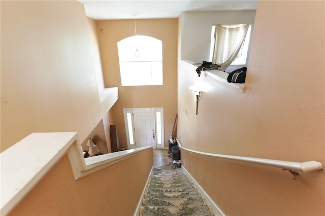 2305 Rio Grande Forest Ln, Kissimmee, FL 34759 - hall featuring stone finish floors and baseboards