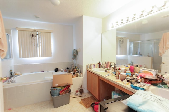 2305 Rio Grande Forest Ln, Kissimmee, FL 34759 - full bath featuring a shower stall, a garden tub, double vanity, and tile patterned floors