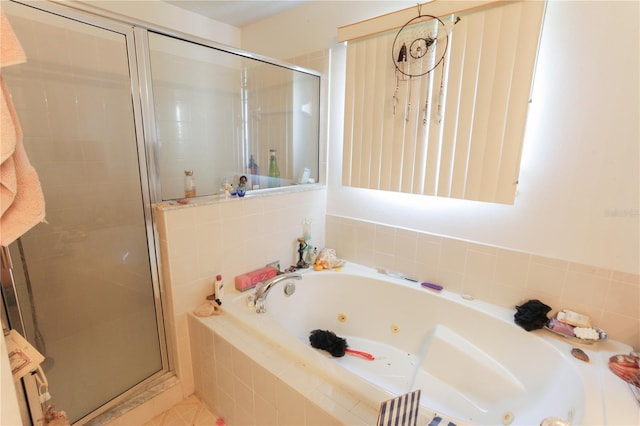 2305 Rio Grande Forest Ln, Kissimmee, FL 34759 - full bathroom with a stall shower and a tub with jets