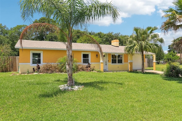 2704 Yule Tree Dr, Edgewater, FL 32141 - ranch-style house featuring stucco siding and a chimney