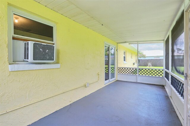 2704 Yule Tree Dr, Edgewater, FL 32141 - unfurnished sunroom featuring cooling unit