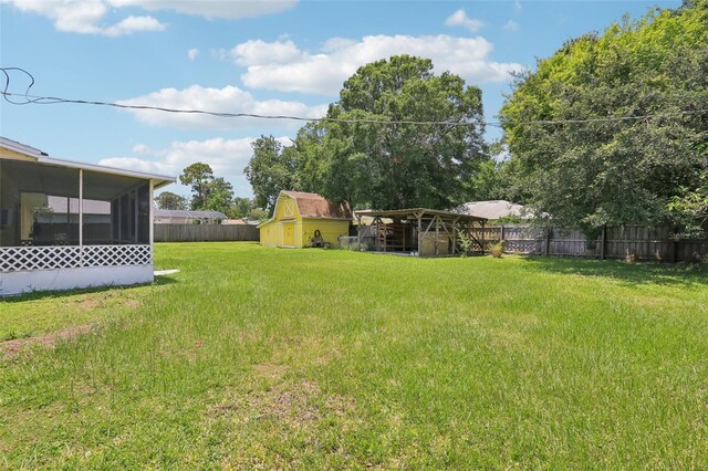 2704 Yule Tree Dr, Edgewater, FL 32141 - view of yard with a sunroom