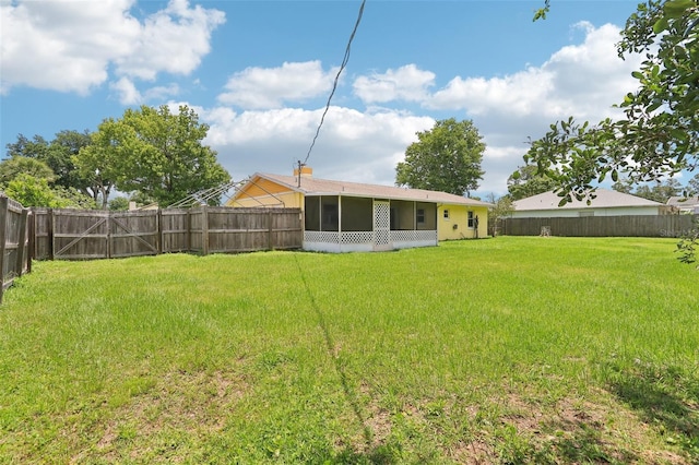 2704 Yule Tree Dr, Edgewater, FL 32141 - back of property with a sunroom