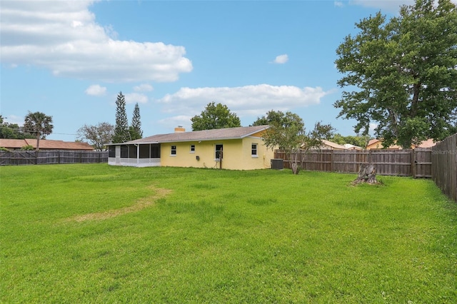 2704 Yule Tree Dr, Edgewater, FL 32141 - view of yard featuring a sunroom and cooling unit