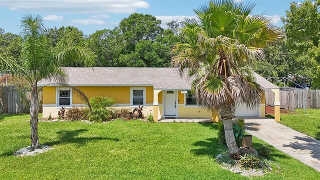 2704 Yule Tree Dr, Edgewater, FL 32141 - ranch-style house featuring stucco siding, concrete driveway, and a shingled roof