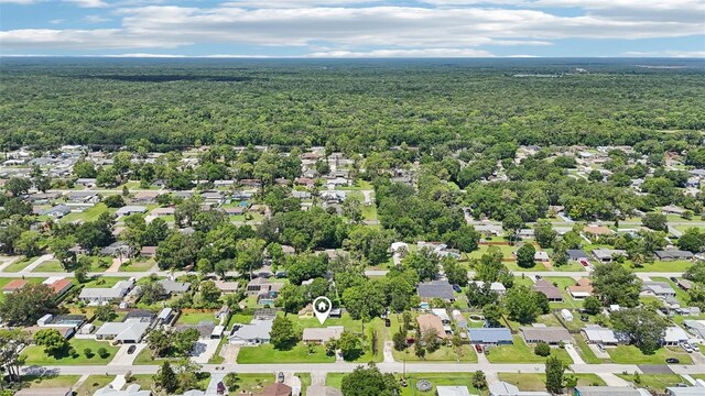 2704 Yule Tree Dr, Edgewater, FL 32141 - aerial perspective of suburban area with a forest