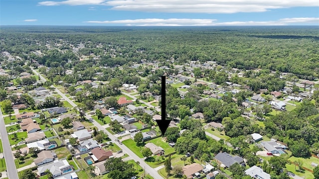 2704 Yule Tree Dr, Edgewater, FL 32141 - aerial perspective of suburban area featuring a heavily wooded area