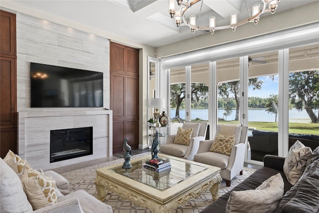 1112 Preserve Point Dr, Winter Park, FL 32789 - living area with a water view, a chandelier, coffered ceiling, beamed ceiling, and a fireplace