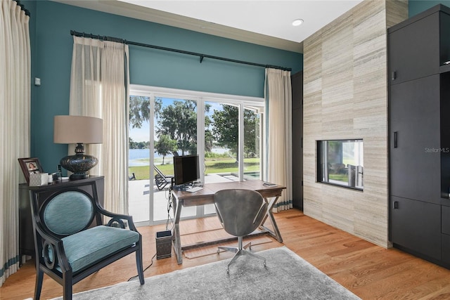 1112 Preserve Point Dr, Winter Park, FL 32789 - office featuring an accent wall, recessed lighting, and light wood-style floors