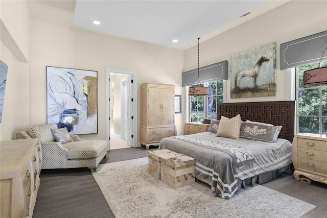 1112 Preserve Point Dr, Winter Park, FL 32789 - bedroom with dark wood-style floors, multiple windows, recessed lighting, and a high ceiling