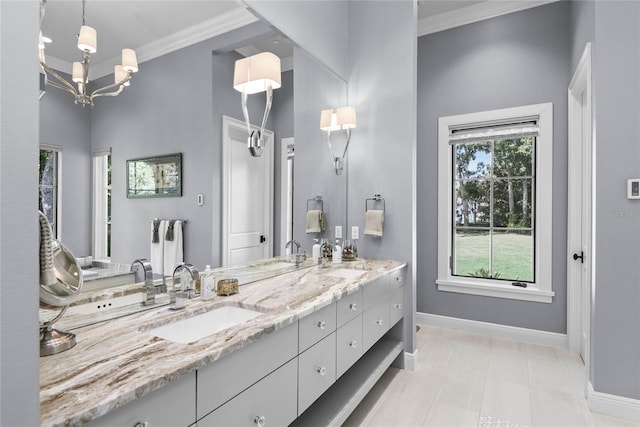 1112 Preserve Point Dr, Winter Park, FL 32789 - full bathroom with baseboards, double vanity, a chandelier, and ornamental molding
