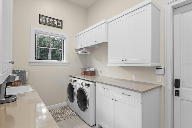 1112 Preserve Point Dr, Winter Park, FL 32789 - washroom featuring cabinet space, washer and dryer, and baseboards