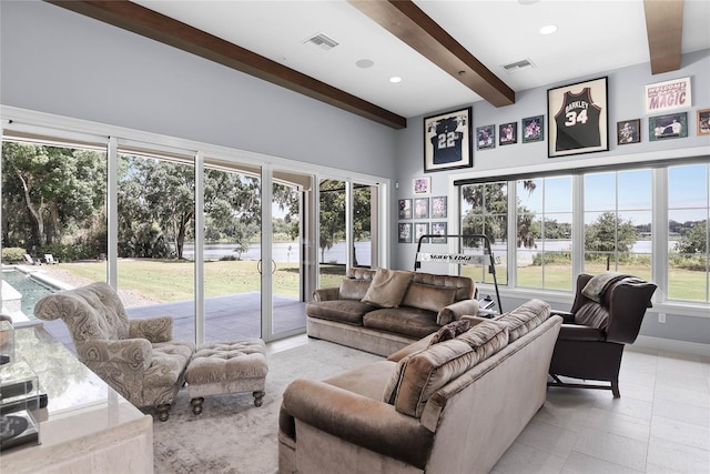 1112 Preserve Point Dr, Winter Park, FL 32789 - living area with beamed ceiling, a water view, and recessed lighting