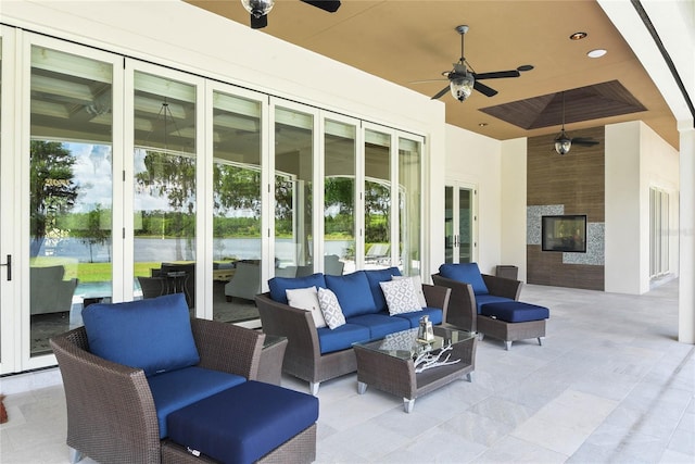 1112 Preserve Point Dr, Winter Park, FL 32789 - view of patio with french doors, an outdoor hangout area, a ceiling fan, and a water view
