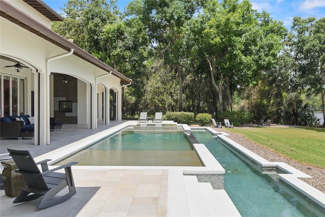 1112 Preserve Point Dr, Winter Park, FL 32789 - view of pool featuring a ceiling fan, a patio area, a lawn, a pool with connected hot tub, and an outdoor hangout area