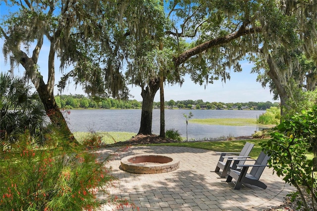 1112 Preserve Point Dr, Winter Park, FL 32789 - view of patio / terrace featuring an outdoor fire pit and a water view