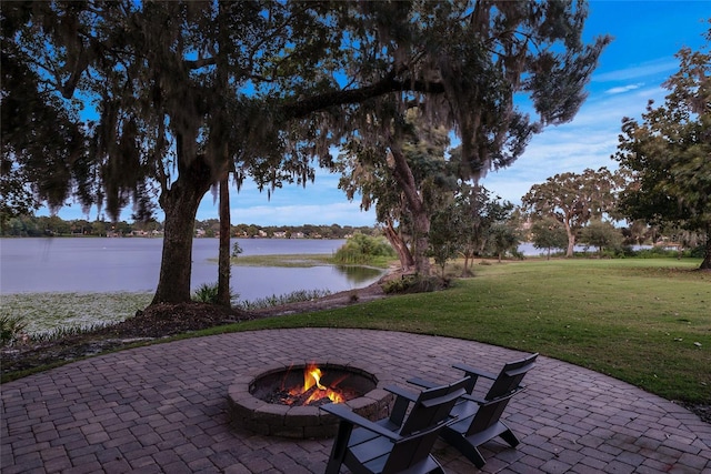 1112 Preserve Point Dr, Winter Park, FL 32789 - view of patio featuring a fire pit and a water view