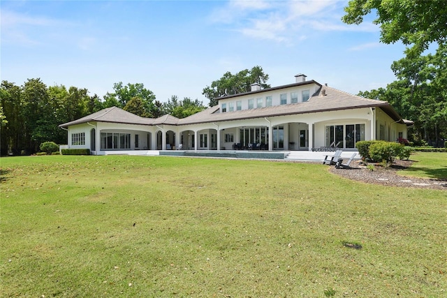 1112 Preserve Point Dr, Winter Park, FL 32789 - rear view of house featuring a yard and a chimney