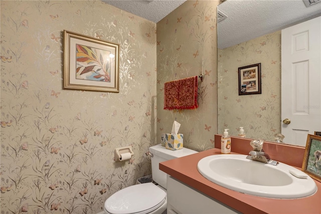 2132 Palm Vista Dr, Apopka, FL 32712 - half bath with a textured ceiling, vanity, and toilet