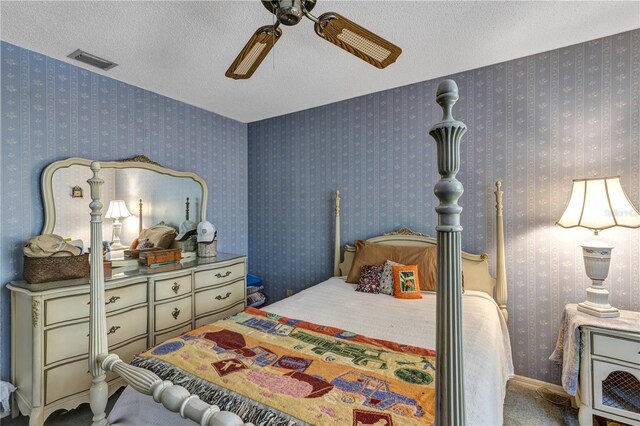 2132 Palm Vista Dr, Apopka, FL 32712 - bedroom featuring ceiling fan and a textured ceiling