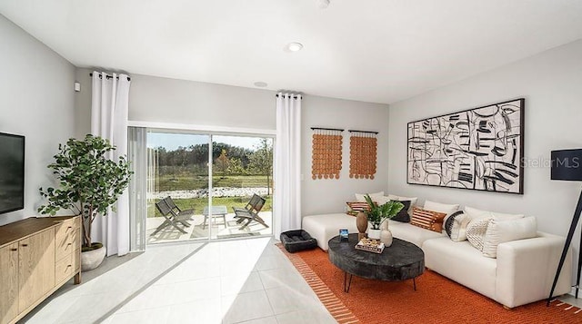 130 River Front Way, Edgewater, FL 32141 - living room featuring light tile patterned floors and recessed lighting