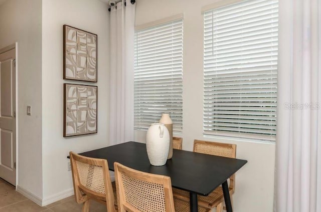 130 River Front Way, Edgewater, FL 32141 - dining area featuring tile patterned floors and baseboards