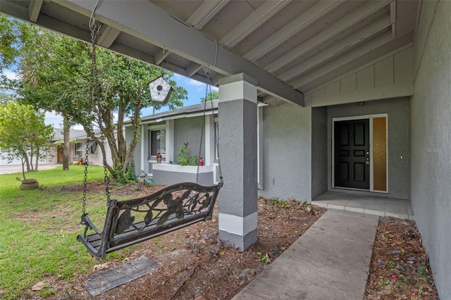 885 Little Bend Rd, Altamonte Springs, FL 32714 - entrance to property with stucco siding and a lawn