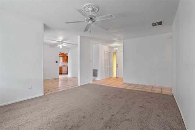 885 Little Bend Rd, Altamonte Springs, FL 32714 - tiled spare room featuring carpet flooring, a ceiling fan, and baseboards