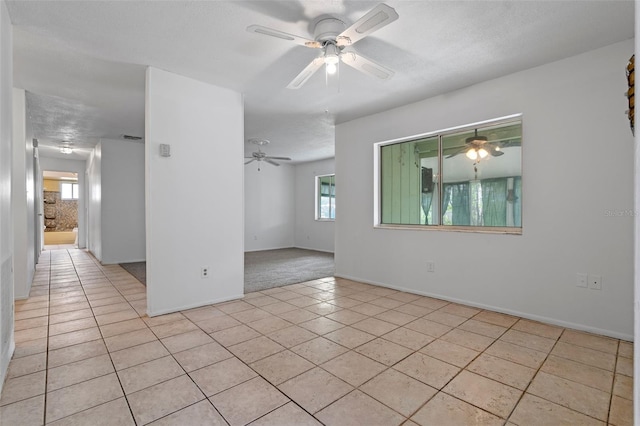 885 Little Bend Rd, Altamonte Springs, FL 32714 - empty room with light tile patterned flooring, ceiling fan, and baseboards