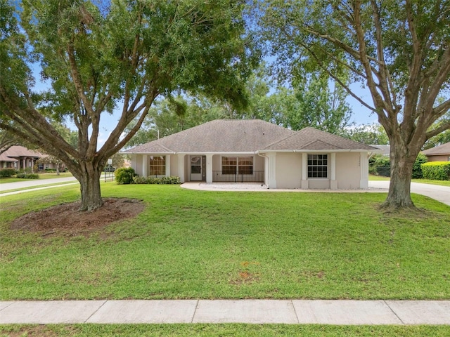 11648 Grand Bay Blvd, Clermont, FL 34711 - single story home with a front yard and stucco siding
