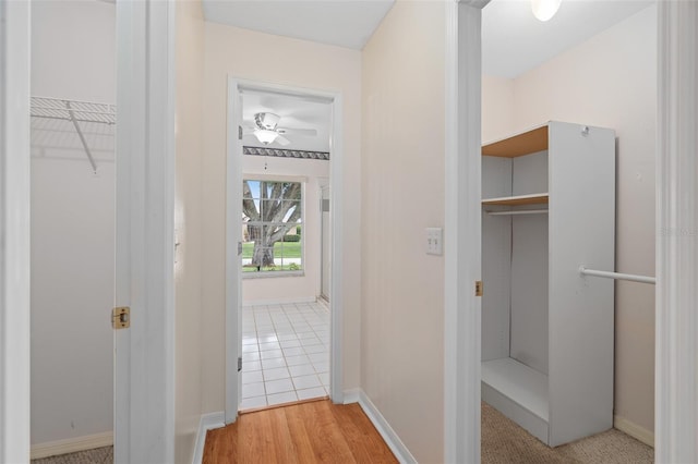 11648 Grand Bay Blvd, Clermont, FL 34711 - hallway featuring baseboards
