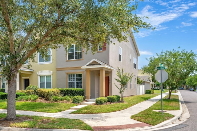 12963 Garridan Ave, Windermere, FL 34786 - townhome / multi-family property with stucco siding