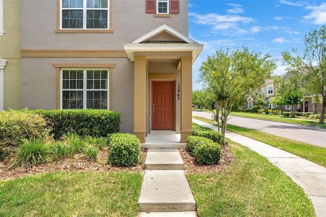 12963 Garridan Ave, Windermere, FL 34786 - entrance to property with stucco siding