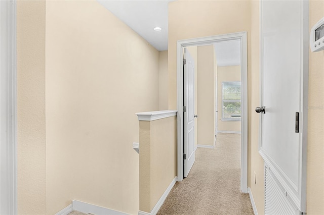 12963 Garridan Ave, Windermere, FL 34786 - hall featuring baseboards, light colored carpet, an upstairs landing, and recessed lighting