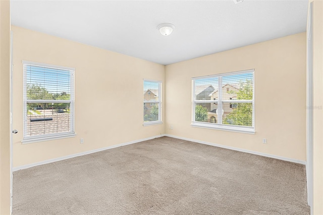 12963 Garridan Ave, Windermere, FL 34786 - carpeted spare room featuring baseboards