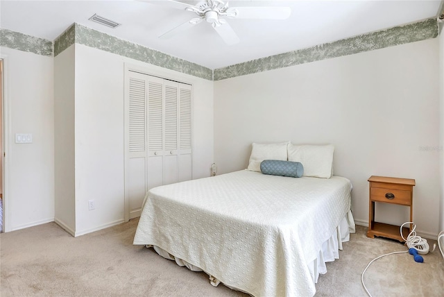 5382 SW 84th Pl, Ocala, FL 34476 - carpeted bedroom with a closet, ceiling fan, and baseboards