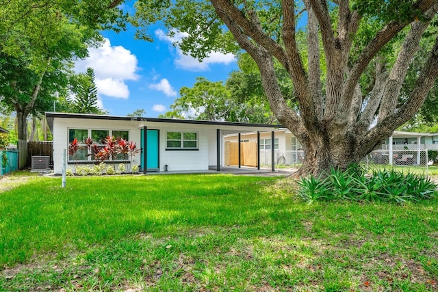 7616 Simms Ave, Orlando, FL 32812 - view of front of house featuring central AC unit and an attached carport