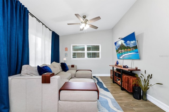 7616 Simms Ave, Orlando, FL 32812 - living room featuring baseboards, wood finished floors, ceiling fan, and lofted ceiling