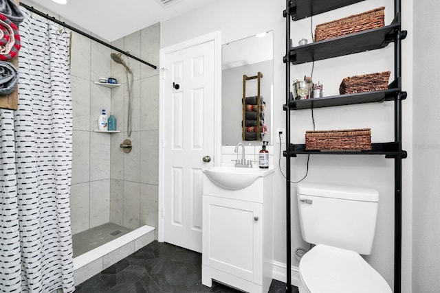 7616 Simms Ave, Orlando, FL 32812 - bathroom featuring a shower stall, vanity, and toilet